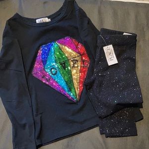 Lola the boys long sleeve shirt with place leggings. Shirt was worn twice.